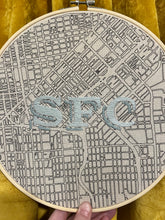 Load image into Gallery viewer, 2-toned Blue 10 inch &quot;SFC&quot; Downtown San Francisco Hand-Drawn art Map of the Bay Area &amp; Hand- Embroidered Art deco Letters Hoop
