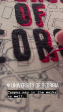Load and play video in Gallery viewer, UGA - 10 inch Classic City College Campus Map - “University of Georgia” Hand Drawn Art Map with hand embroidery Hoop (black &amp; red)
