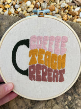 Load image into Gallery viewer, 6 inch &quot;Coffee Teach Repeat&quot; Mug Shape in Vintage 70s Colors Hand-Embroidered Hoop
