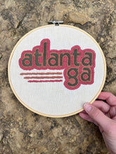 Load image into Gallery viewer, 8 Inch Lowercase Atlanta, GA 70s Vibe Font and Colors Hand-Embroidered Hoop
